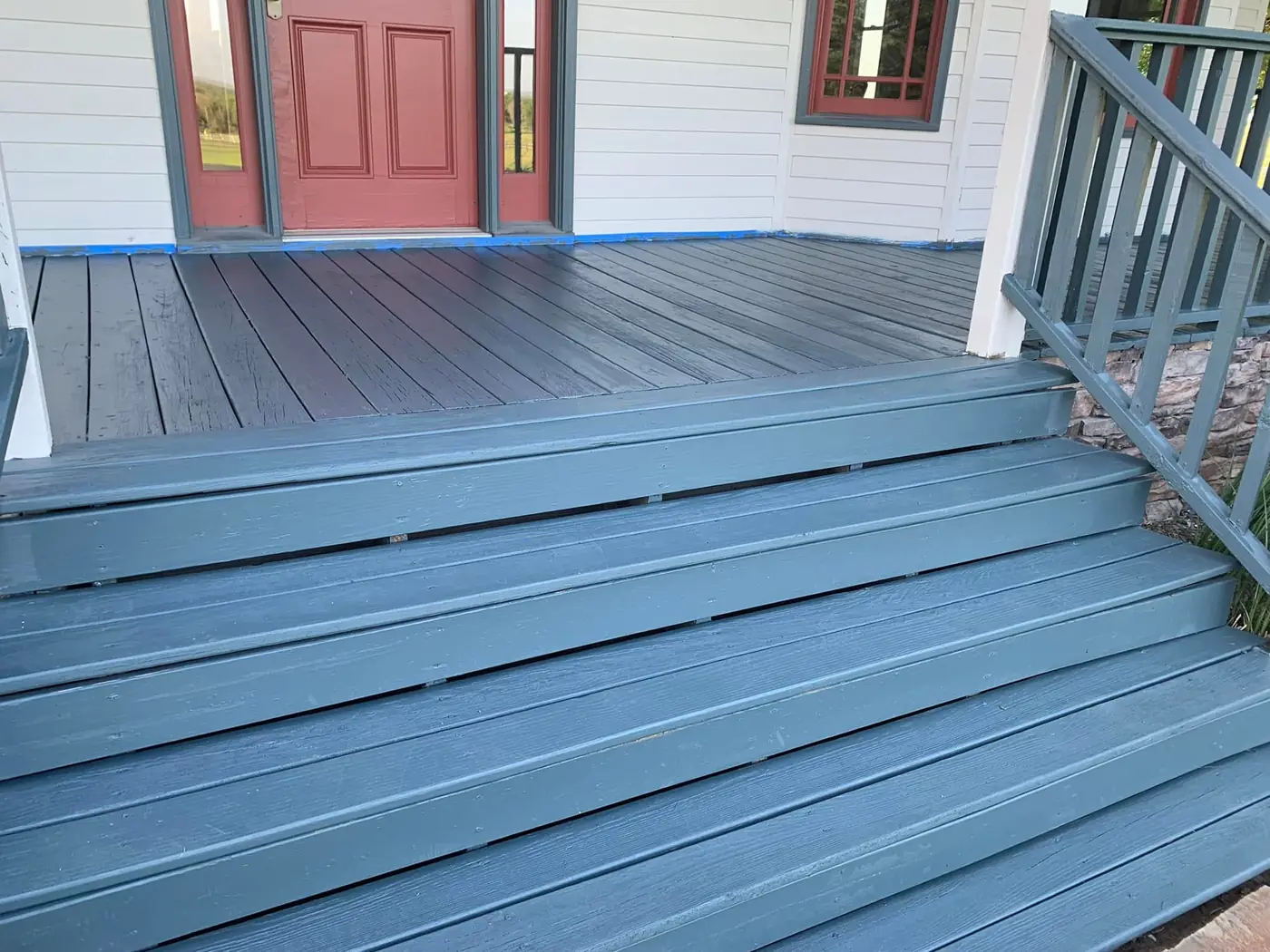 Finished painted wood deck and stairs in Tulsa Oklahoma