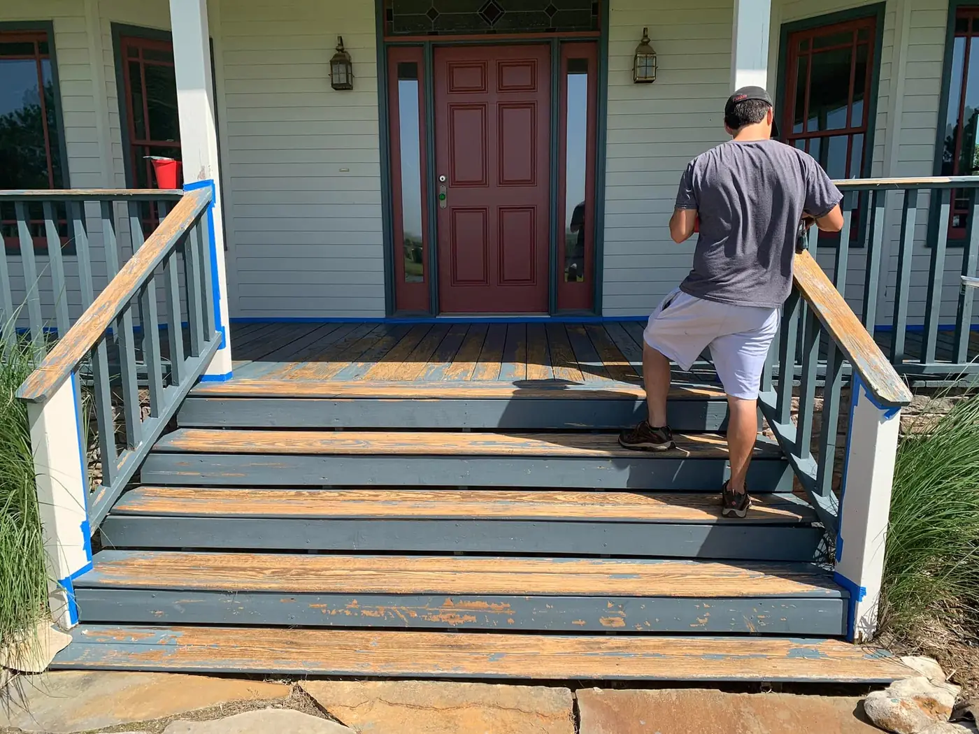 Wood deck and stairs during paint preparation in Tulsa