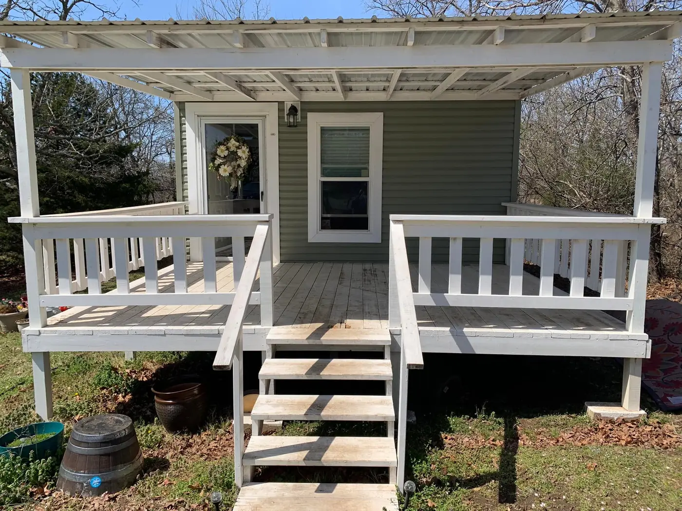 Wood porch and deck before repainting in Tulsa